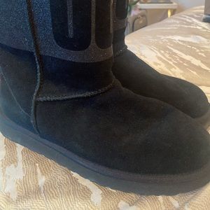 UGG Black mid-calf boot with shimmering embossed UGG print. Size 9.
